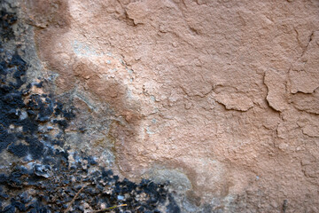 Close-Up of Textured Rock Surface with Blue and Brown Patterns