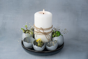 Easter holiday decoration from sustainable materials egg shell decor with candle. Copy space Diy do it yourself Gift present idea. Zero waste Crafting preparation holiday