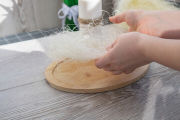 Unrecognizable woman creating Easter holiday decoration from sustainable materials egg shell. Diy do it yourself step by step instruction. Gift present idea Crafting preparation holiday