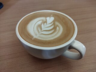 cup of cappuccino with great latte art 