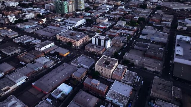Aerial footage of  the Skid Row neighborhood at sunset in Los Angeles, California, USA