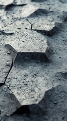 Closeup view of cracked dry and arid textured surface of weathered earth or soil in a desolate barren desert landscape  The pattern of cracks and fractures in the ground create a graphic