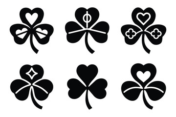 Fototapeta premium Shamrock icon set with heart details, 6 black clover vector silhouettes for Saint Patricks Day, Irish luck symbols for holiday branding, decorative foliage elements for greeting card designs.
