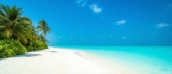 Pristine sandy beach with turquoise ocean waves and white clouds reflected in calm water under a sunny blue sky. Idyllic Maldives landscape, copy space. Made with generative AI