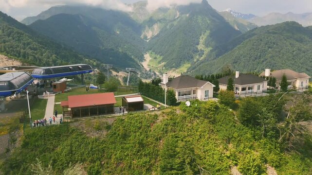 Drone scenic view of lush green mountains with forest landscape on hill in Gebele, Azerbaijan