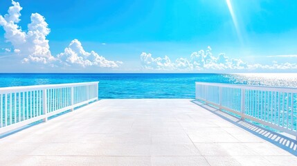 Fototapeta premium White wooden pier overlooking the calm blue ocean under a bright sunny sky.