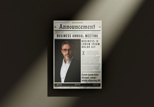 business man holding a newspaper