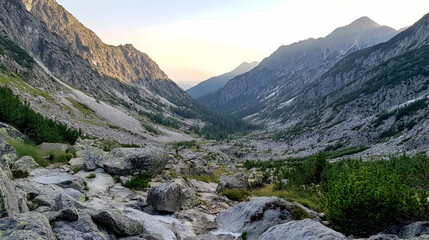 Majestic mountain valley sunrise, rocky stream, travel photography