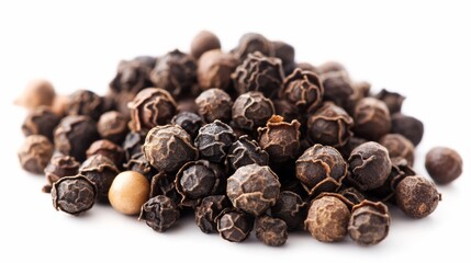 Close-up view of a pile of peppercorns isolated on a white background showing detail textures