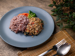 Jasmine Red Cargo Rice with Stir-Fried Basil Chicken. Pad-kaprao, Thai food.