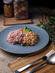 Jasmine Red Cargo Rice with Stir-Fried Basil Chicken. Pad-kaprao, Thai food.