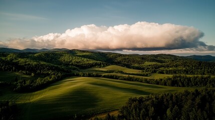 Fototapeta premium Serene Rolling Hills Landscape Green Fields Fluffy Clouds Summer Nature Panorama