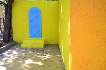 door in the wall. Indian archtecture. stone walll. 