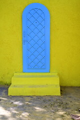 door in a wall. Indian archtecture. yellow stone wall. 