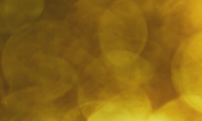 Abstract golden yellow glitter festive gouche bokeh light dark contrast party celebration texture mellow elegant background