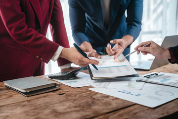 A close-up of a businessman explaining finance, business planning, and marketing during a meeting...