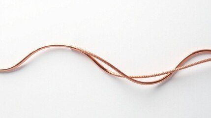 Rose gold metallic wire elegantly curved on a white background, showcasing its smooth texture and subtle sheen.