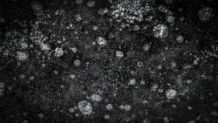 abstract dark blank frozen ice sheet nature landscape with texture detail winter cold temperature background