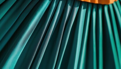 Elegant pleats of a turquoise skirt fashion showcase textile details bright lighting close-up view style inspiration