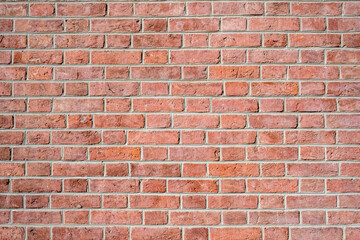 Background from a wall made of clean red bricks