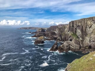 Fototapeta premium A beautiful ocean view with rocky cliffs against the horizon, Collection of Travel in Ireland