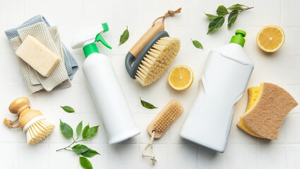 Eco friendly cleaning products promoting sustainable lifestyle on white tiles