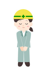 お辞儀をするヘルメットを被った女性作業員