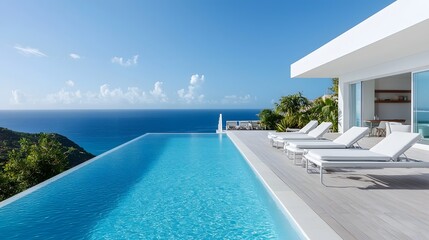 Fototapeta premium Luxurious oceanfront villa with a sleek modern design and stunning panoramic views of the turquoise waters and azure skies This high end getaway offers a tranquil retreat amidst a serene