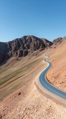 Fototapeta premium Scenic Winding Road Through Colorful Desert Mountains