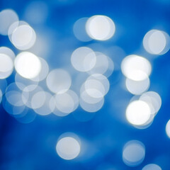 Blue bokeh abstract glow light. Energy flow defocused blurred motion abstract background.