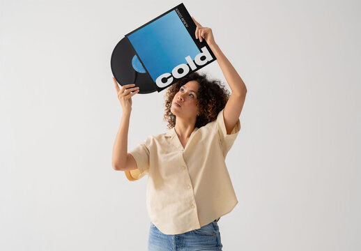 Mockup Of Woman Holding Customizable Record Above Head