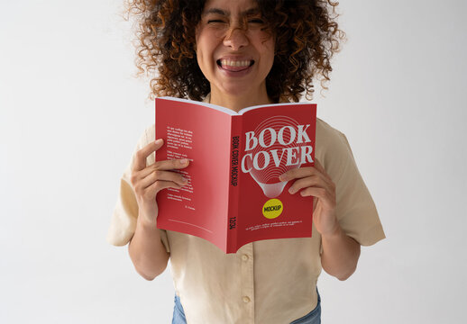 Mockup Of Woman Reading Customized Book