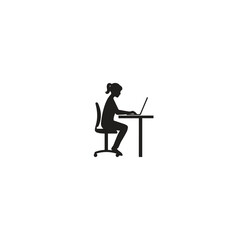 Silhouette of a person sitting at a desk with a laptop, symbolizing work or productivity