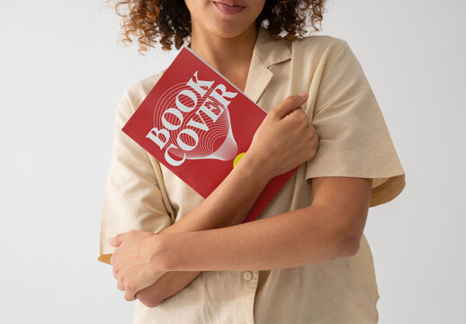 Mockup Of Woman Holding Customized Book