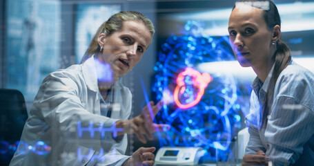Physician and Patient Analyze a Holographic Body Model. Technology Discussions on Optimizied Health...