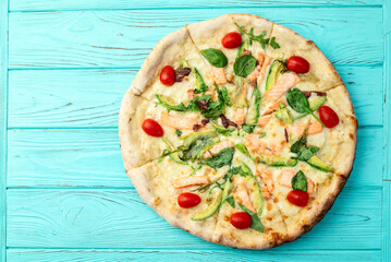 Italian pizza with avocado salmon  tomatoes and mozzarella photography. top view