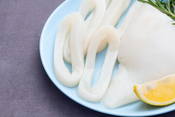 Squid tube and ring photography . Seafood top view