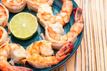 Grilled Tiger shrimps with lime photography . Top view