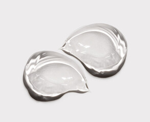 cosmetic smear cream gel texture on a light background