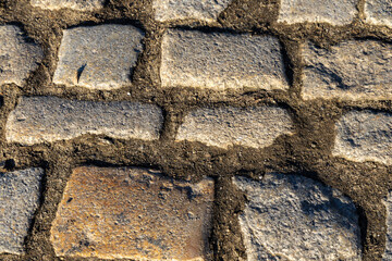 Retro Cobblestone Road, Close-up, Background. Poland, Wroclaw