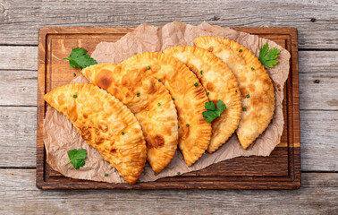 Snack chebureks. Pasties with meat photography . Top view