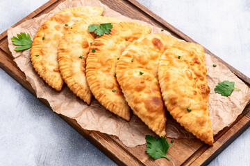 Snack chebureks. Pasties with meat photography . Top view