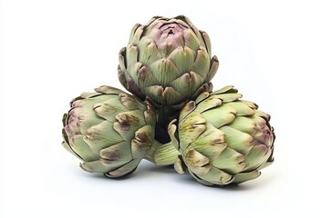 Fototapeta premium Pile of three artichokes isolated on a white background