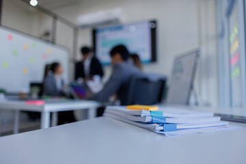 Group of Business people planning at whiteboard in office meeting,team business work with documents tax laptop computer in office.	