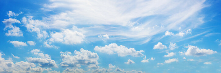 Blue sky background with tiny clouds. Panoramic image of blue sky.