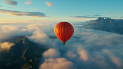 Obraz premium Hot air balloon floats over clouds and mountains during sunset in a vibrant sky
