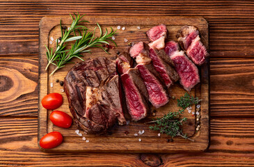 Ribeye grilled  beef steak sliced . Rare doneness photography . Top view