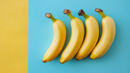 Ripe bananas on vibrant yellow and blue background