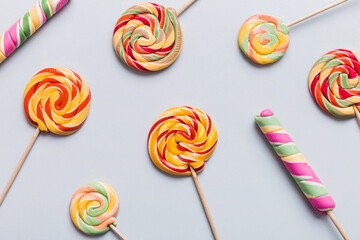 Set of colorful lollipops on colored background. Summer concept. Party Happy Birthday or Minimalist Concept