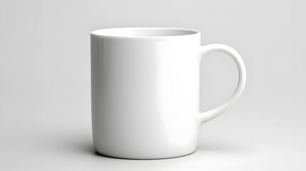 Elegant and minimalist white ceramic mug isolated on a clean simple white background in a 16 9 aspect This versatile kitchen or tableware item is perfect for product shots packaging designs